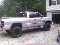 Pic of the black H2 wheels and Nitto terra grapplers-black-rims.jpg